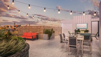 A rendering of a rooftop patio with a sunset in the background